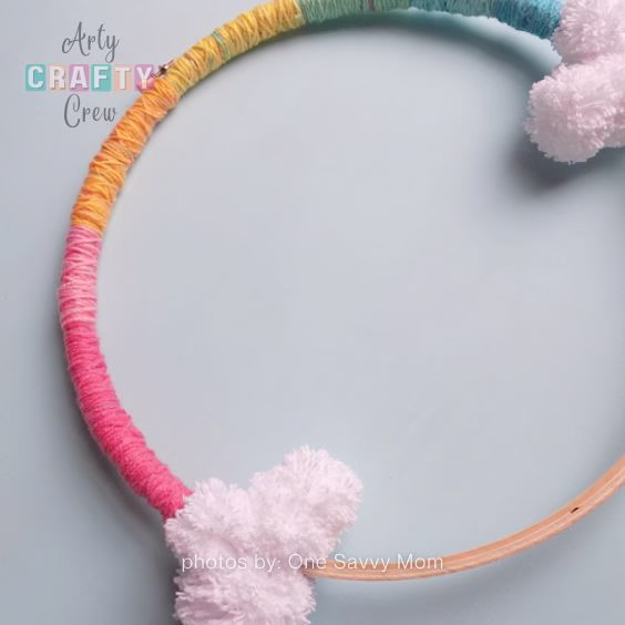 Easy DIY Gradient Rainbow Yarn Hoop Wall Art - 15 Dopamine Decor Ideas For Your Living Room - Arty Crafty Crew